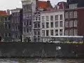 A View of Amsterdam, Holland, from a Canal Taxi