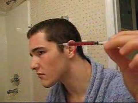 how to drain fluid from ears