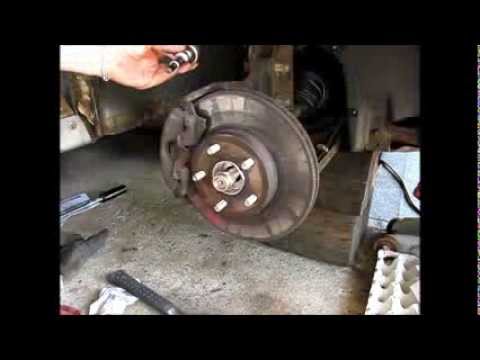 Replacing a front wheel bearing and hub assembly on a 1997 GM Pontiac Grand AM