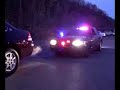 Unmarked Crown Vic with Code 3 unmarked package