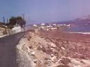 Beautiful view of Aghios Sostis in Mykonos.. and funny road trip with red zips.. ps.. always use the helmet.. he he he..