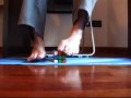 Cubo mágico com os pés em 1:07.70 min