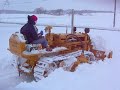 Daughter Andrea Plowing the driveway with the 1952 Caterpillar D2  winter of 2006