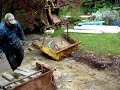 Two Excavator hoppers used to move cut concrete