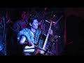 Mongolian Traditional throat singers in a restaurant in Ulan Bator. Solo on a Morin khuur. Traditional horse head violin