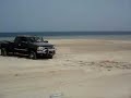 Toyota FJ stuck in Inlandsea in Qatar pulled by GMC Truck
