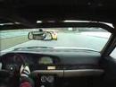 Porsche 944T race car following a Ferrari F355 at Mosport