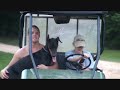 zack is on the tractor raking hay