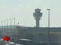 Germans Raid Plane, 2 Arrested