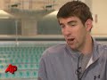 swimmer michael phelps' three-month suspension is over. in an interview with the associated press, the olympic gold medalist said he will swim in a meet next week in north carolina. (may 6)