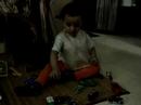 Surjo is playing with his toys