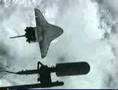 Space Shuttle Discovery back flip Maneuver