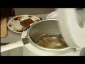 Delia Smith in the kitchen making a Mars Bar Special