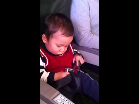 how to fasten the seatbelt in plane