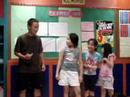 Lau Wen Hui entertaining the kids at...