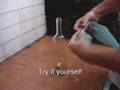 Removing a cork from the bottle trick