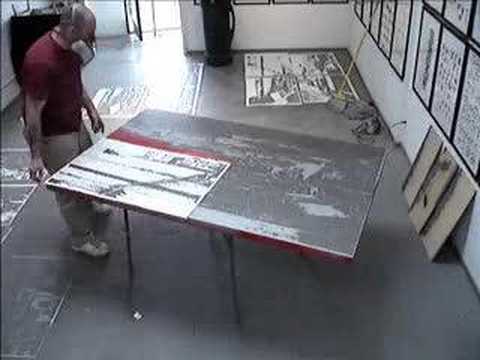 Logan Hicks Spraying Stencil