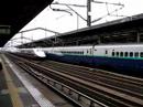 Shinkansen Hayate-Komachi passes by at Utsunomiya station