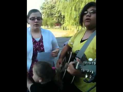 Elizabeth burks singing at the apostolic light house drive