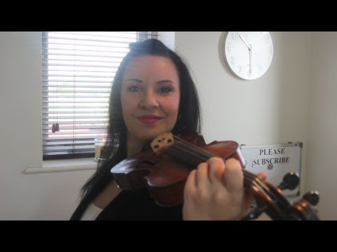 how to hold a violin properly