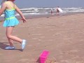 Round and round on the beach.