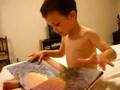 Hunter-reading-his-d