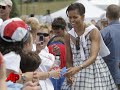 From her love of bold colors to her penchant for figure-hugging sillouettes, Michelle Obama is the first lady fashion designers and style watchers have been waiting for. (Jan. 9)