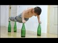 Kid Does Push Ups On Glass Bottles....Watch More Videos On http://displaypix.com/