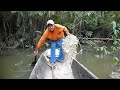 the grandfather, sacario, sets the net for some piranhas and hopefully some catfish