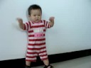 Trevor dancing against wall