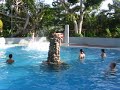 William climbing in a pool