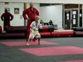 Young Student Practices Tae Kwon Do Form 5