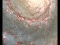 a pan of the whirlpool galaxy that reveals the fine details captured by hubble's advanced camera for surveys across the spiral arms, dust lanes, and galaxy companion.