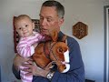 eden and grandpa riding her new christmas present.