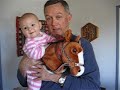 eden and grandpa riding her new christmas present.