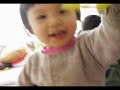 Baby Natalie playing with cousin Vanessa