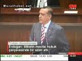Başbakan Erdoğan, sahnede bir bayanın başörtüsünü indiren Tuncay Özkan'a giydirdi: 'Sizin insanlığın bu kadar'