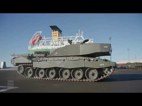 Video: tanks, other armored vehicles for NATO battle group unloaded in ...