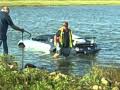Bugatti Veyron towed from saltwater lagoon
