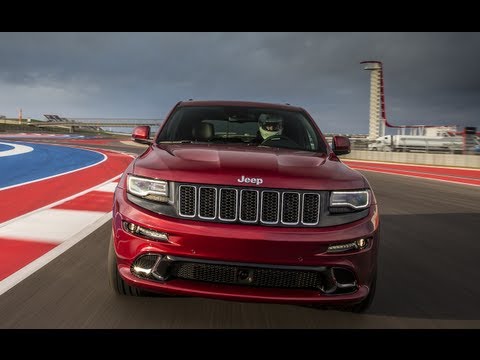 srt - http://www.TFLcar.com ) The 2014 Jeep Grand Cherokee SRT is a 470 horsepower all-wheel-drive performance machine. But how does the new 2014 Jeep Grand Cher...