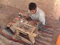 2005.10.12-Kid Prepping Trilobite-Alnif, Morocco