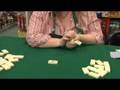 videos de Board Games & Card Games : How to Play a Game of Dominoes