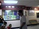 Xan and Patrick sing and play music improving as they go at the entrance of Lassiter High School.