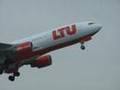 LTU Airbus A330-200 is taking off in Duesseldorf