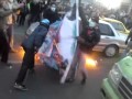 Iran New video 14 Feb 2011, khomeini khamenei pic is on fire