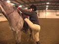 Watch as a horse expert demonstrates how to swing up while mounting ahorse in this free online video about horseback riding. Expert: Mara Keith-Hunter Contact: www.sycamore-stables.com Bio: Mara Keith-Hunter is a lifelong equestrian and head coach for the Hampshire College equestrian team. She rode in the Intercollegiate National Horse Show for two universities. Filmmaker: David Pakman