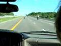 Motorcycle Wheelie on Highway