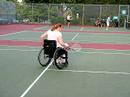 Elizabeth playing wheelchair tennis