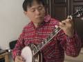 Playing \"Lonesome Road Blues\"