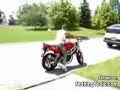 stupid guy crashes with motorbike into tree